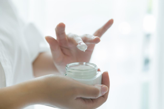 Apply skin care products with fingers